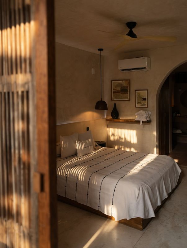 Morning light across a bed at Xique, Puerto Escondido